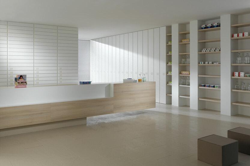 Impressionen einer Apothekeneinrichtung Impressionen einer Apothekeneinrichtung mit hellen Holzmöbeln und geräumigem Regalsystem, sowie aufgeräumten Empfang.